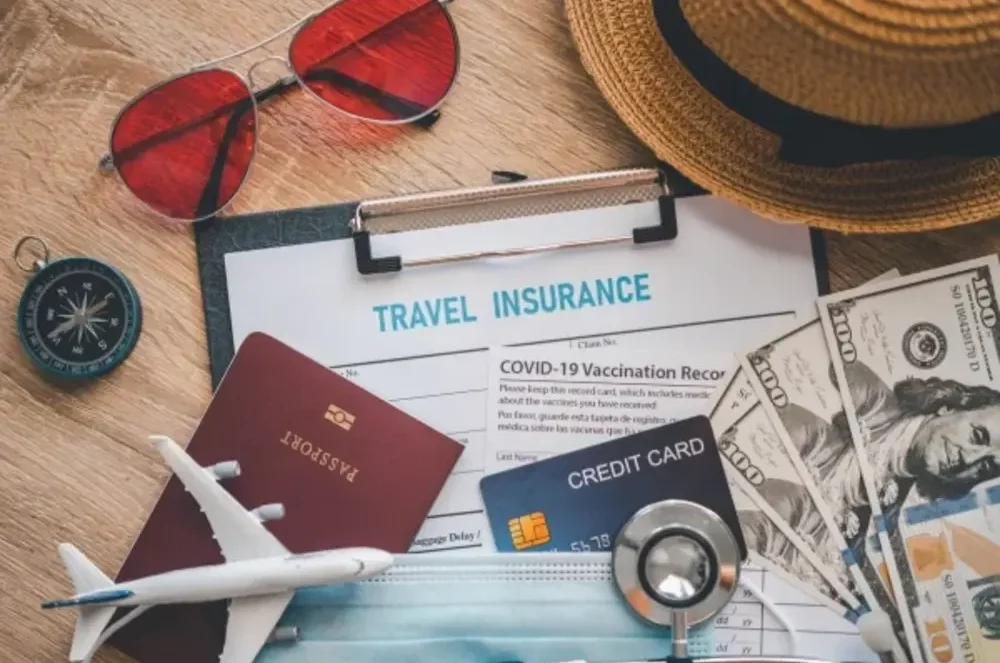 Travel-insurance-featured-image-e1684353975541-1 Travel-insurance-featured-image-e1684353975541-1